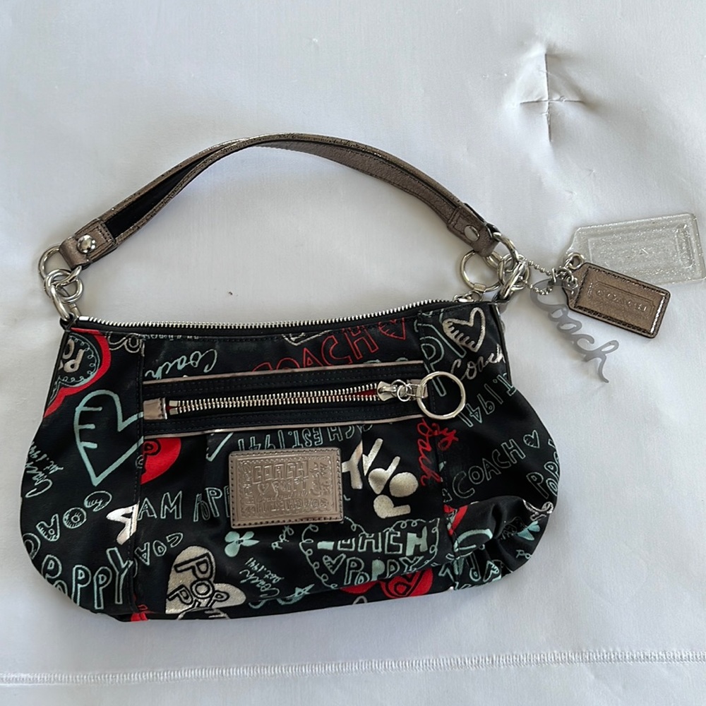 Coach shoulder bag. Black red and teal.